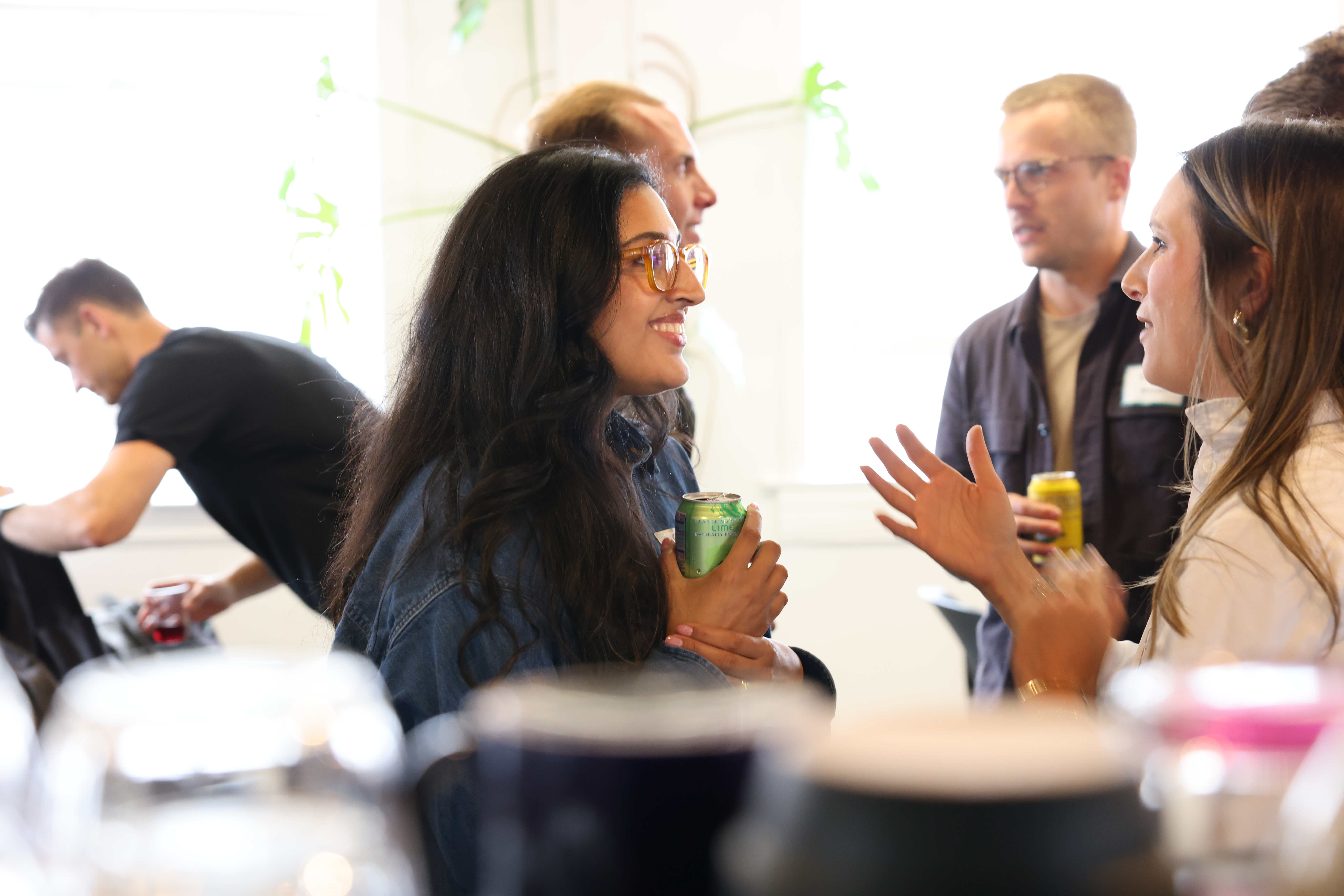 Community members connecting over refreshments